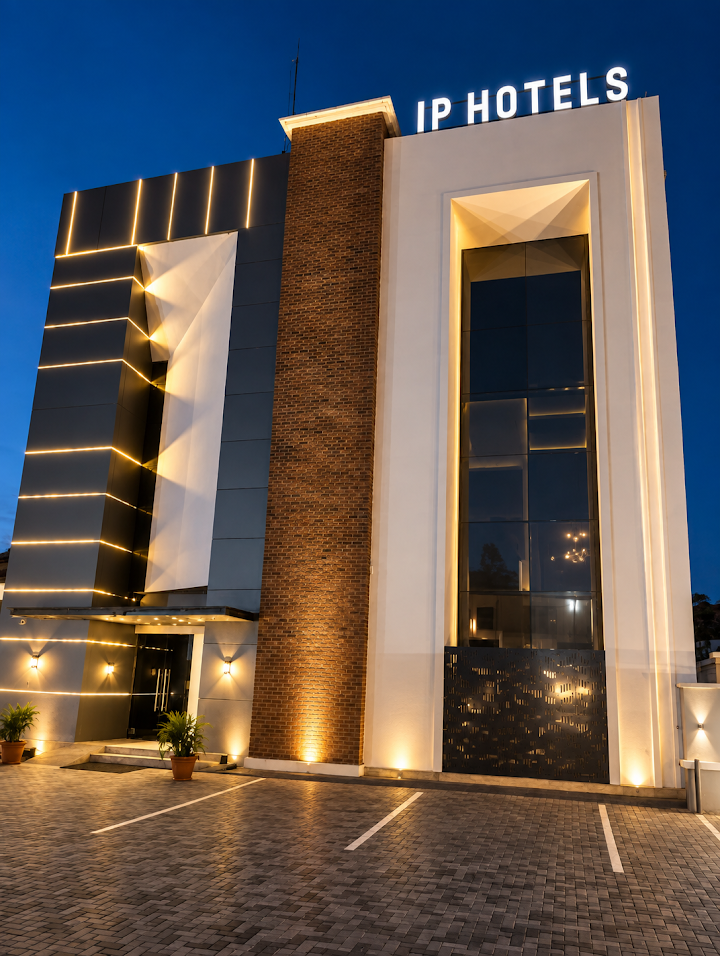 IP Hotels building illuminated at dusk in Effurun
